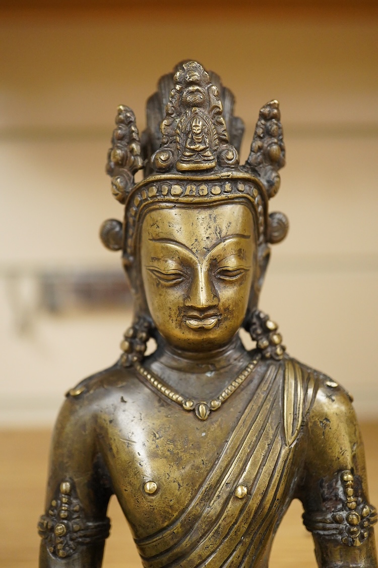 A Nepalese bronze seated figure of Avalokiteshvara, 19th century, 18cm high